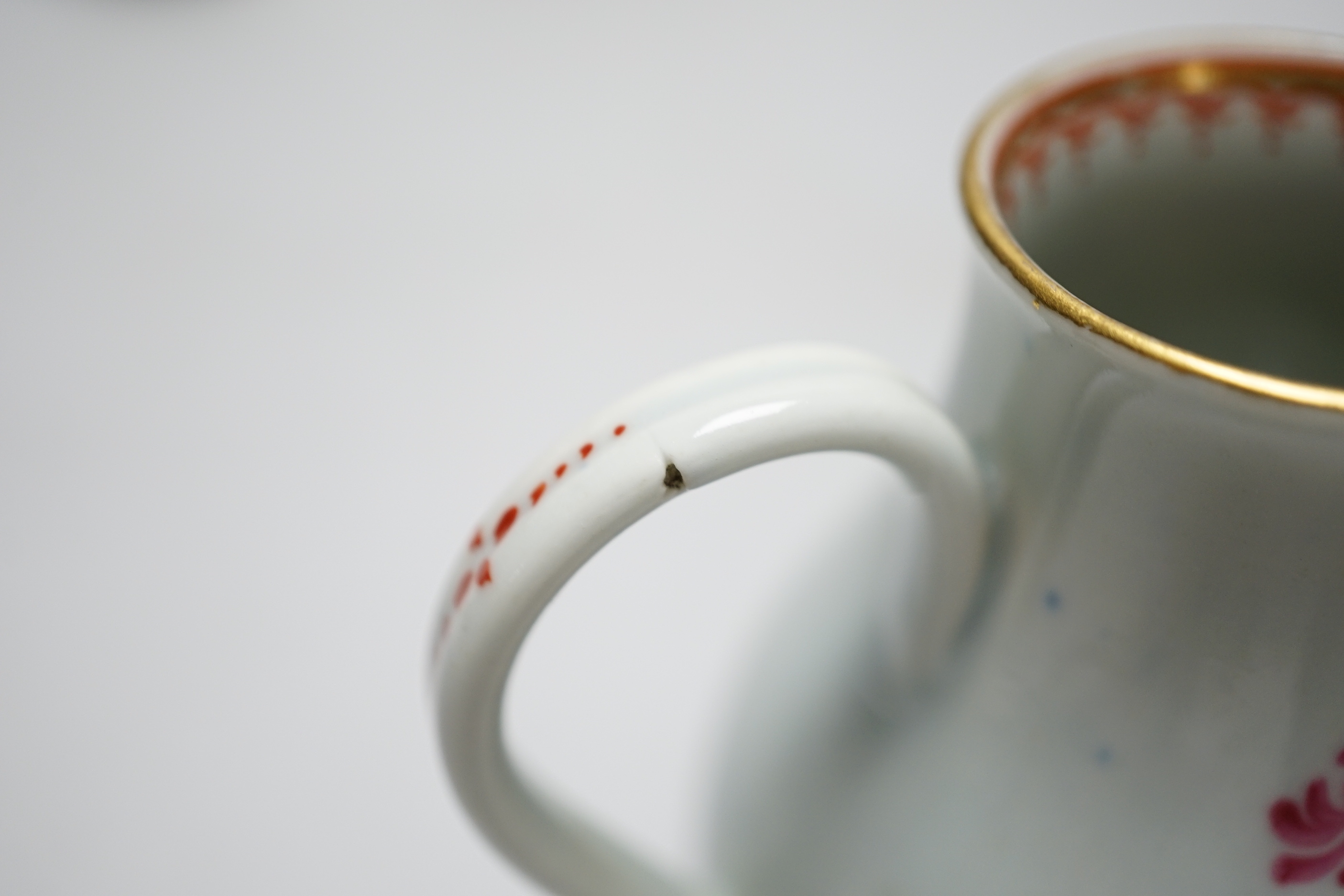 Two Worcester flower painted sparrow-beak jugs, c.1780 and an English porcelain milk jug, c.1825 (3)